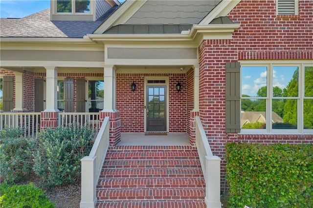 4424 Longmead Rd, Flowery Branch, GA 30542 - property entrance featuring brick siding, covered porch, and a shingled roof