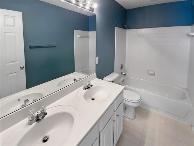 full bathroom featuring bathtub / shower combination, vanity, and toilet