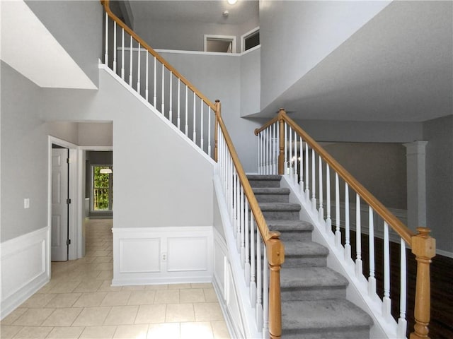 staircase with tile patterned flooring