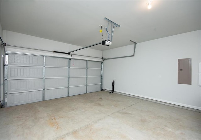 garage featuring a garage door opener and electric panel