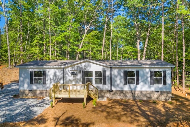 551 Fern Valley Trl, Clarkesville, GA 30523 - manufactured / mobile home with crawl space, a deck, and a shingled roof