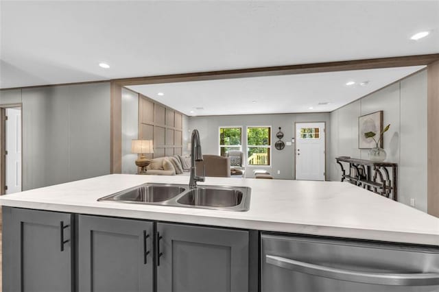 551 Fern Valley Trl, Clarkesville, GA 30523 - kitchen with gray cabinets, stainless steel dishwasher, a sink, open floor plan, and light countertops