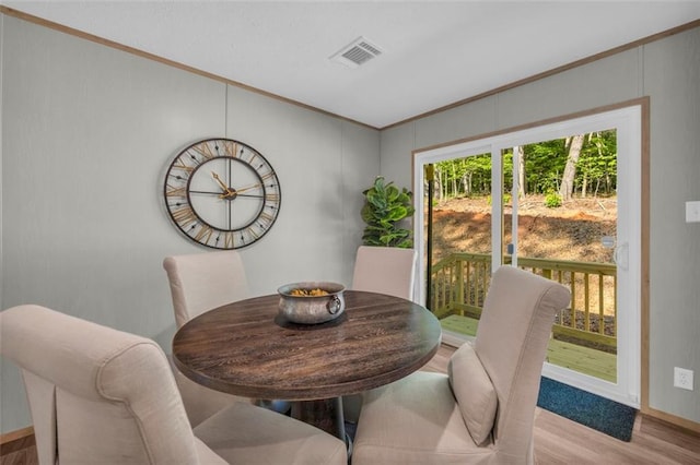 551 Fern Valley Trl, Clarkesville, GA 30523 - dining room with crown molding, wood finished floors, and baseboards
