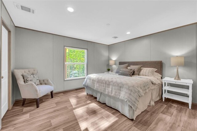 551 Fern Valley Trl, Clarkesville, GA 30523 - bedroom with light wood-type flooring, crown molding, and recessed lighting