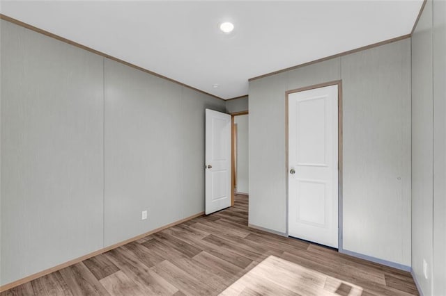 551 Fern Valley Trl, Clarkesville, GA 30523 - unfurnished bedroom with ornamental molding, wood finished floors, baseboards, and recessed lighting