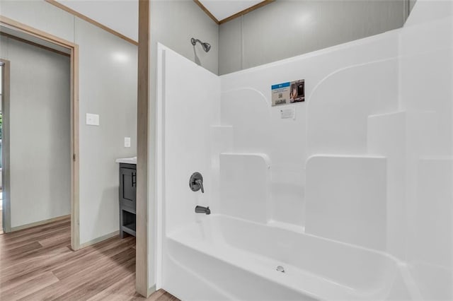 551 Fern Valley Trl, Clarkesville, GA 30523 - bathroom featuring shower / tub combination, wood finished floors, vanity, and baseboards