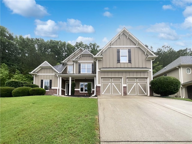 200 Pine Trl, Dallas, GA 30157 - craftsman house featuring board and batten siding, concrete driveway, a garage, a front yard, and brick siding