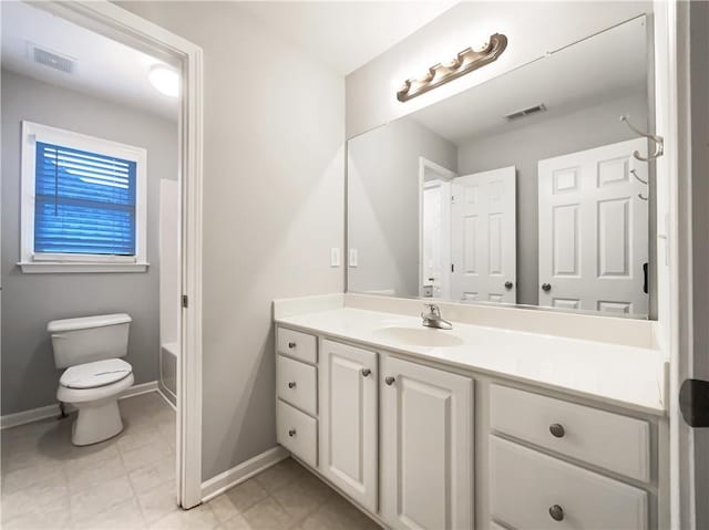 200 Pine Trl, Dallas, GA 30157 - bathroom featuring vanity, toilet, baseboards, and a tub to relax in