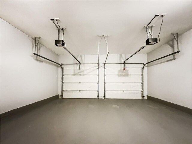200 Pine Trl, Dallas, GA 30157 - garage featuring a garage door opener