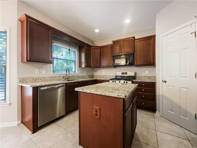 200 Pine Trl, Dallas, GA 30157 - kitchen featuring black microwave, dishwasher, range, a sink, and a kitchen island