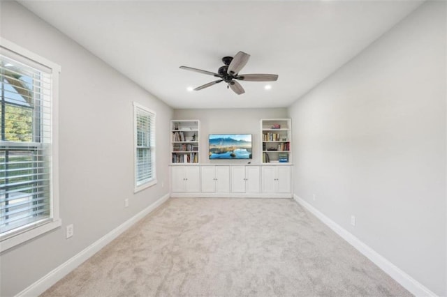 interior space featuring ceiling fan