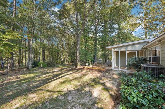 view of yard featuring central AC