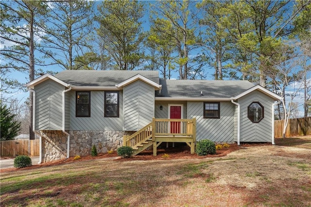 ranch-style house with a front lawn