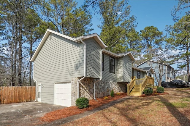 view of side of property featuring a garage