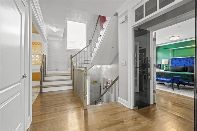 1165 Laurel Pl SE, Smyrna, GA 30080 - stairway featuring wood finished floors and ornamental molding