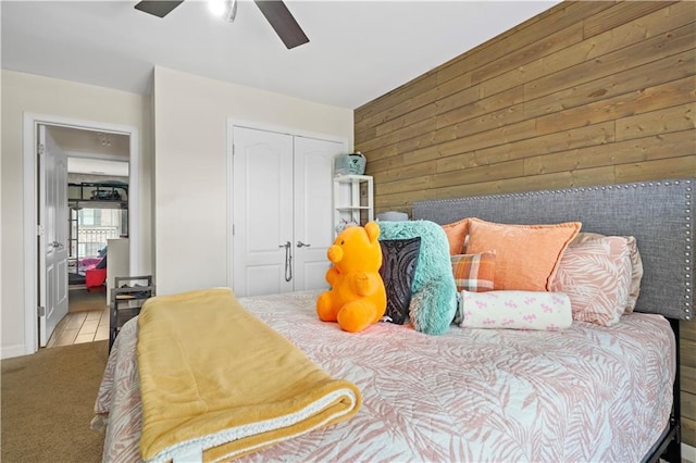1165 Laurel Pl SE, Smyrna, GA 30080 - bedroom with wood walls, a closet, carpet, and a ceiling fan