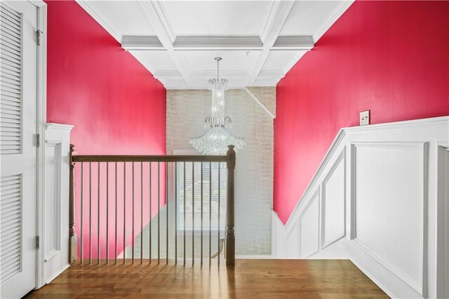 1165 Laurel Pl SE, Smyrna, GA 30080 - stairs with a chandelier, coffered ceiling, beamed ceiling, and ornamental molding