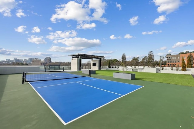 view of sport court featuring basketball hoop