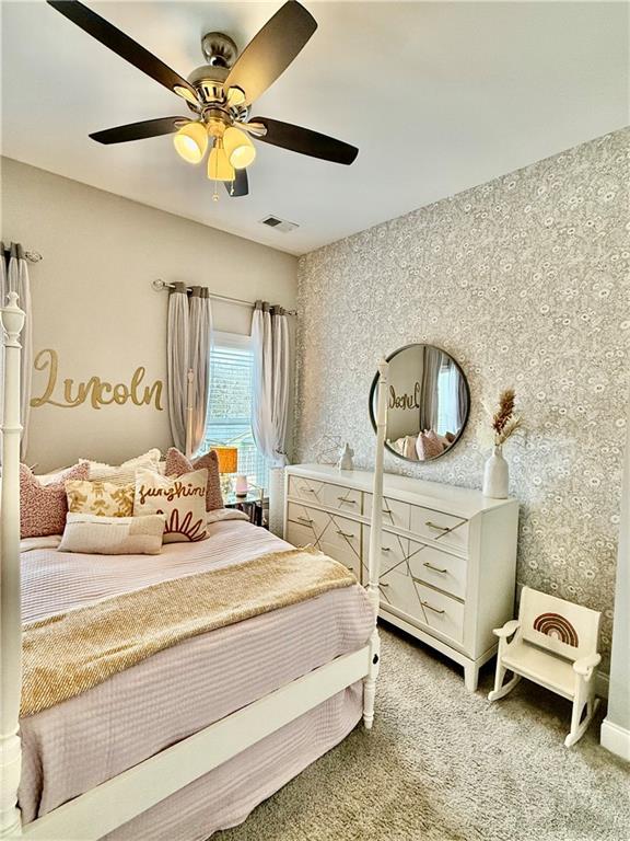 bedroom featuring carpet floors and ceiling fan