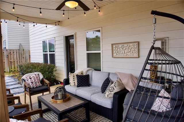 view of patio / terrace with an outdoor living space and ceiling fan