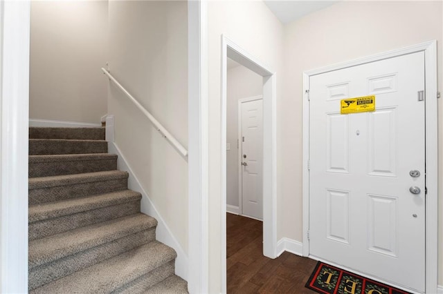 entrance foyer featuring dark hardwood / wood-style flooring