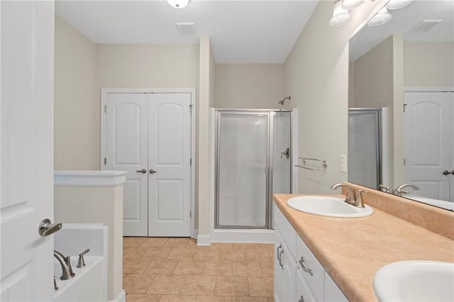 bathroom featuring plus walk in shower and vanity