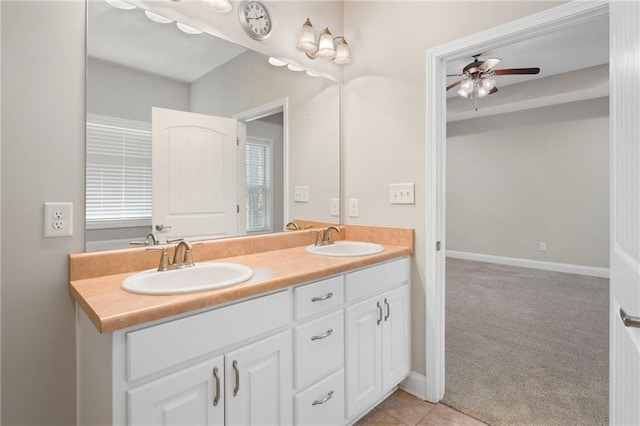 bathroom with vanity and ceiling fan