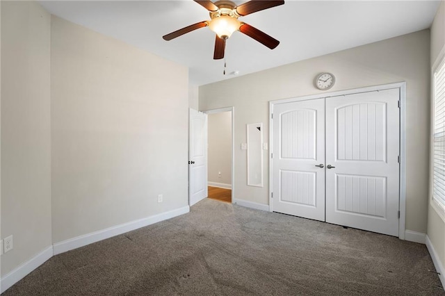 unfurnished bedroom with carpet, ceiling fan, and a closet