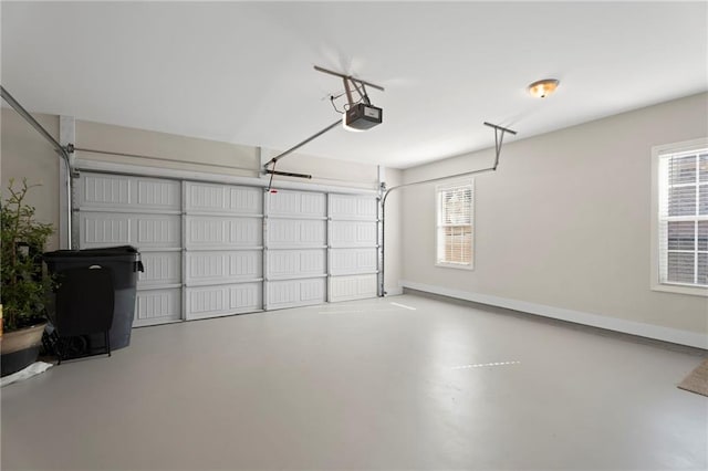 garage featuring a garage door opener