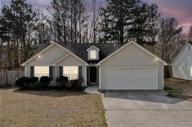 view of front of home featuring a garage