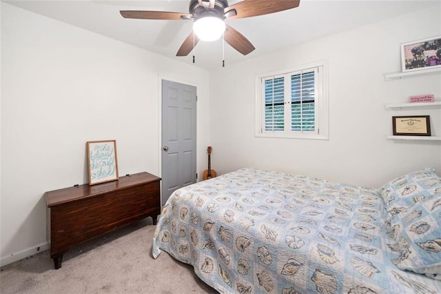 bedroom with carpet flooring and a ceiling fan