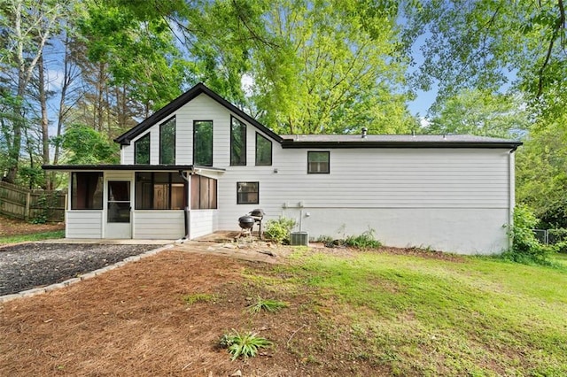 view of front of home featuring a sunroom