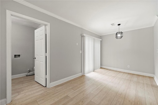 unfurnished room with crown molding and light wood-type flooring