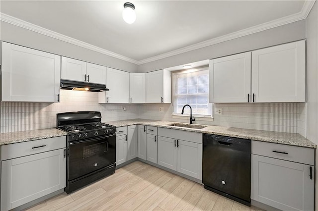 kitchen with sink, white cabinetry, crown molding, light wood-type flooring, and black appliances