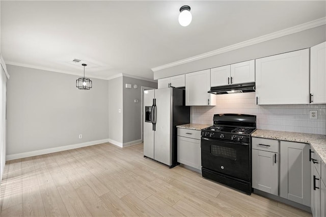 kitchen with crown molding, white cabinetry, tasteful backsplash, stainless steel fridge with ice dispenser, and black range with gas stovetop