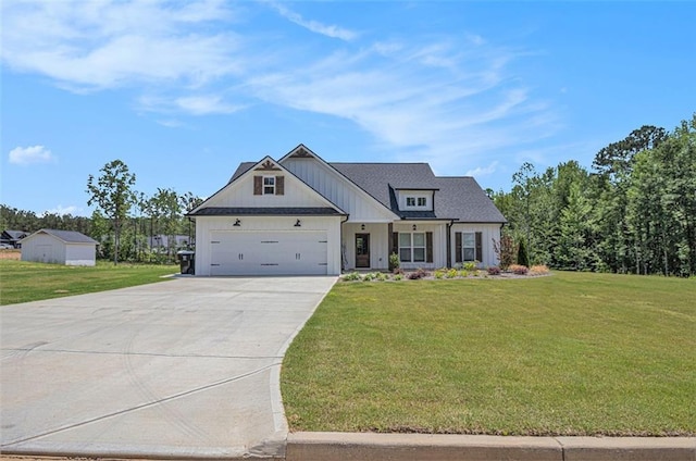 461 Barnwood Dr, Rockmart, GA 30153 - modern farmhouse featuring driveway, a front yard, a garage, and board and batten siding