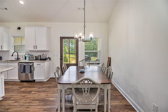 461 Barnwood Dr, Rockmart, GA 30153 - dining space featuring a chandelier, dark wood-type flooring, baseboards, recessed lighting, and vaulted ceiling