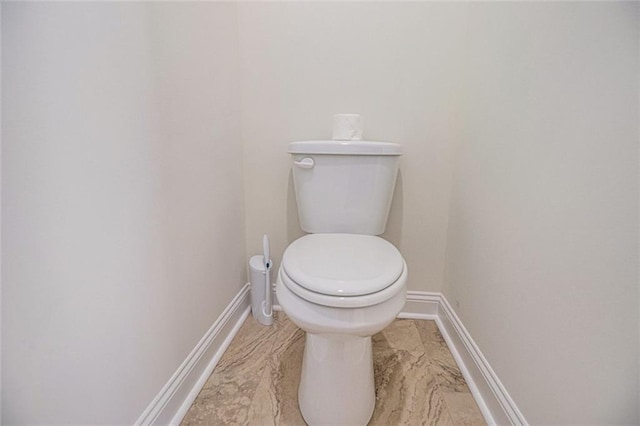 461 Barnwood Dr, Rockmart, GA 30153 - bathroom with toilet, baseboards, and marble finish floors