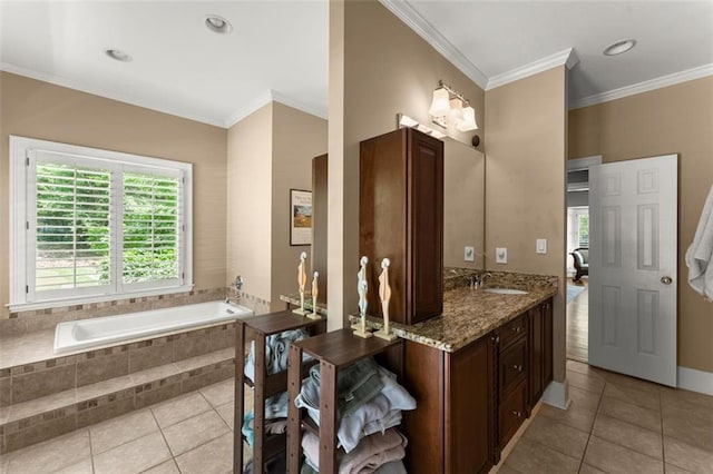 full bath with tile patterned flooring, a bath, ornamental molding, and vanity