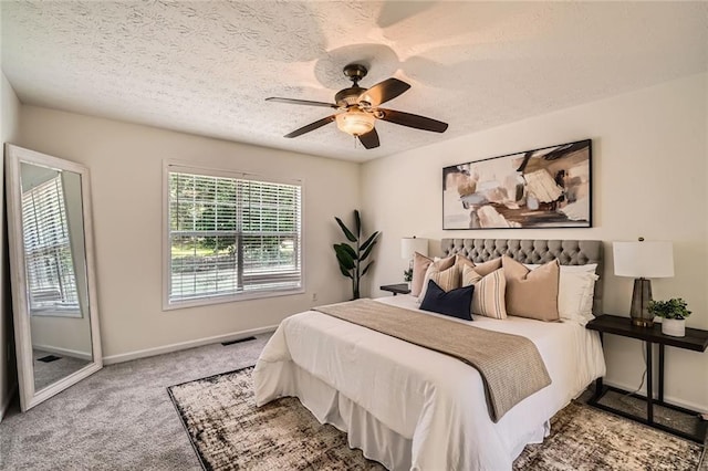 3290 Spincaster Way, Loganville, GA 30052 - carpeted bedroom with a textured ceiling and ceiling fan