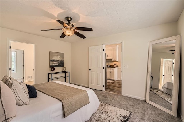 3290 Spincaster Way, Loganville, GA 30052 - bedroom with carpet floors, ensuite bath, and ceiling fan