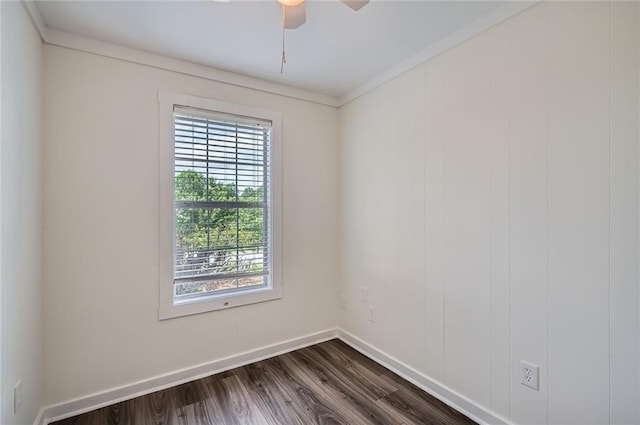 3290 Spincaster Way, Loganville, GA 30052 - spare room featuring plenty of natural light, dark wood finished floors, a ceiling fan, and ornamental molding