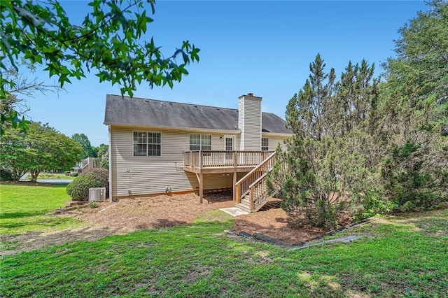 3290 Spincaster Way, Loganville, GA 30052 - back of house with a wooden deck, a yard, a chimney, and stairway