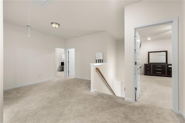 228 Whitneys Way, Dallas, GA 30157 - corridor featuring an upstairs landing, light colored carpet, attic access, and baseboards
