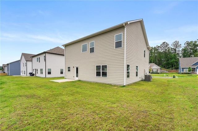 228 Whitneys Way, Dallas, GA 30157 - rear view of house with cooling unit, a patio, and a yard