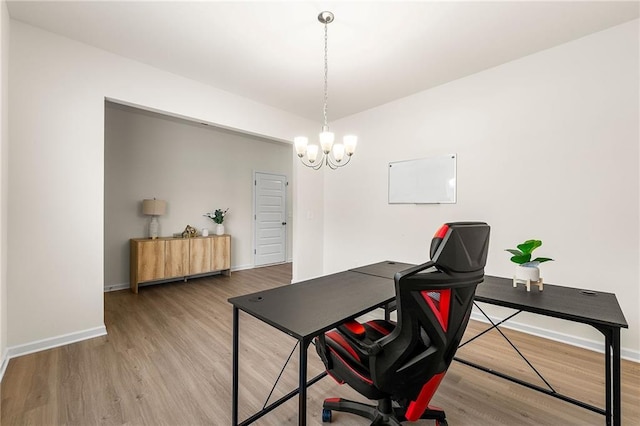 228 Whitneys Way, Dallas, GA 30157 - office space featuring light wood-type flooring, baseboards, and a chandelier