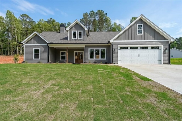 82 Lexie Ct, Rockmart, GA 30153 - view of front facade with a chimney, concrete driveway, a front yard, and an attached garage