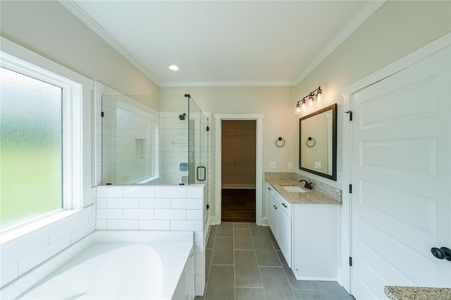 82 Lexie Ct, Rockmart, GA 30153 - full bathroom with a stall shower, tile patterned flooring, ornamental molding, a bath, and a walk in closet