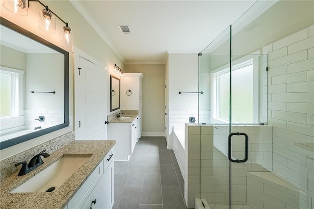 82 Lexie Ct, Rockmart, GA 30153 - bathroom with tile patterned flooring, a shower stall, a bath, crown molding, and two vanities