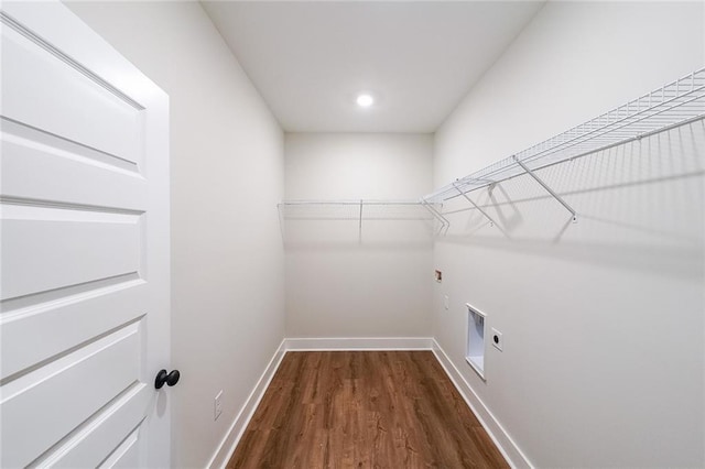 82 Lexie Ct, Rockmart, GA 30153 - laundry area featuring hookup for an electric dryer, wood finished floors, baseboards, recessed lighting, and hookup for a washing machine